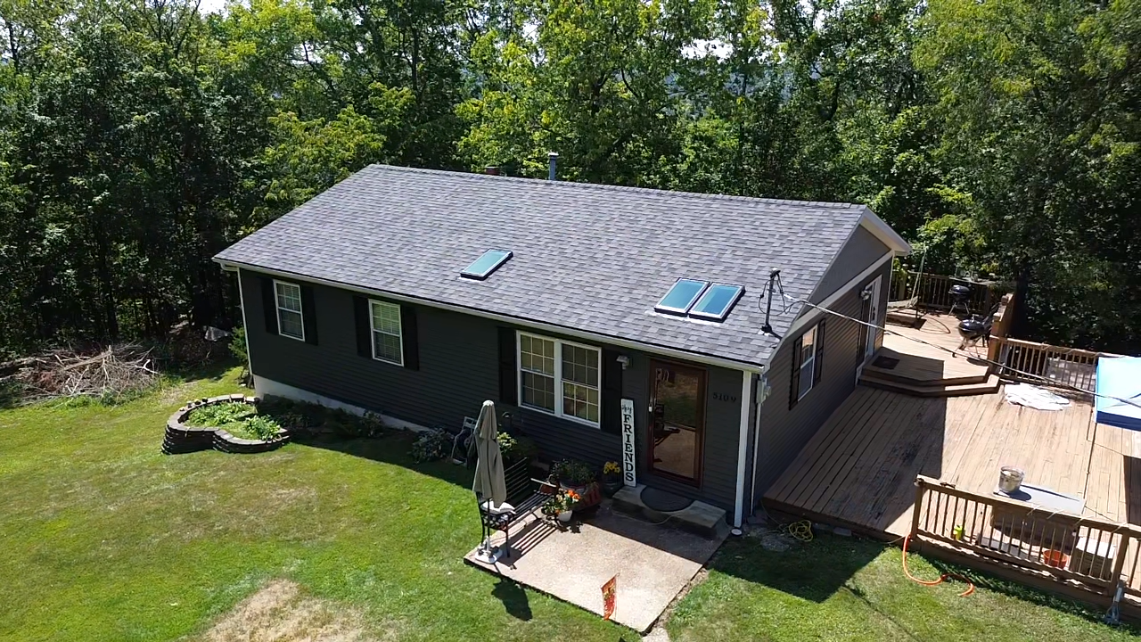 Grey ranch house roofing replacement in Hillsboro MO