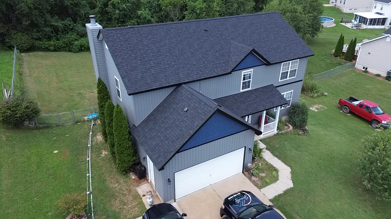 Grey residential shingle roof replacement in St. Charles MO